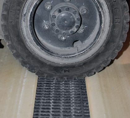 Image of automotive tire driving over PROGrid high load capacity FRP molded grating.