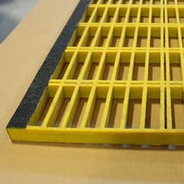Yellow and grey 1 1/2 X 1 1/2 X 6 inch PROGrid Fiberglass Reinforced Plastic molded stair tread.