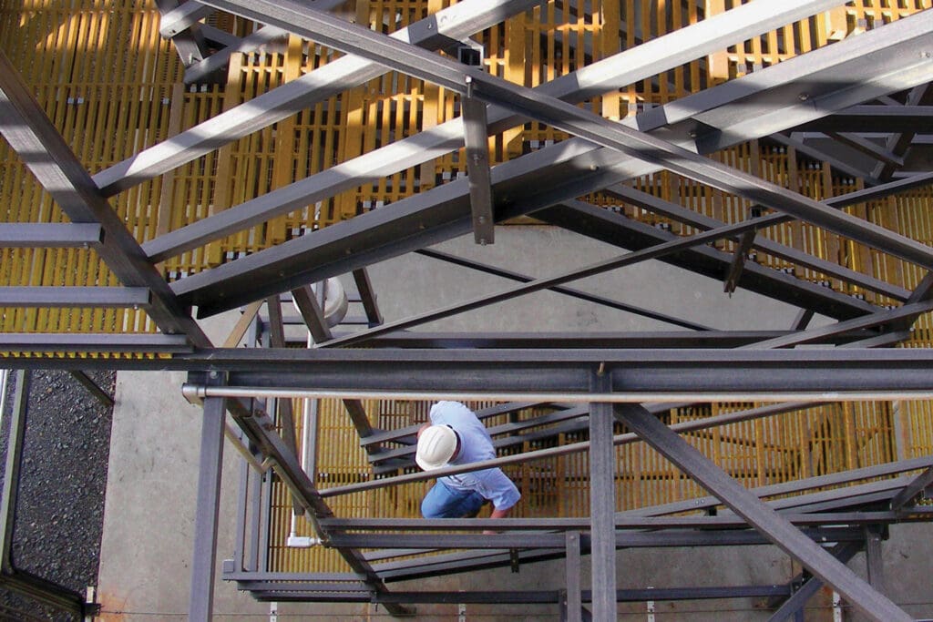ReadyStair at a job site with a man using the stairs to get to the bottom