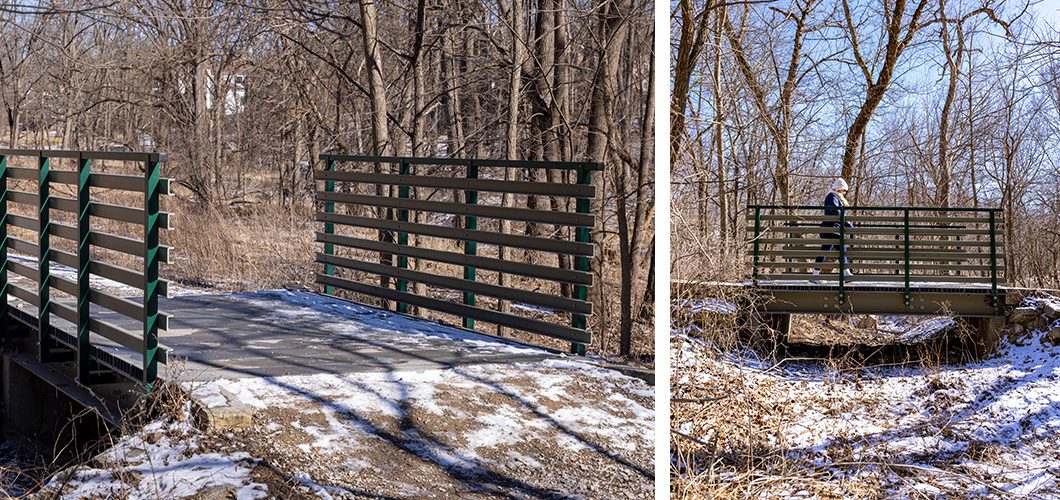 Woman crossing a small pedestrian bridge spanning a ravine in a wooded area